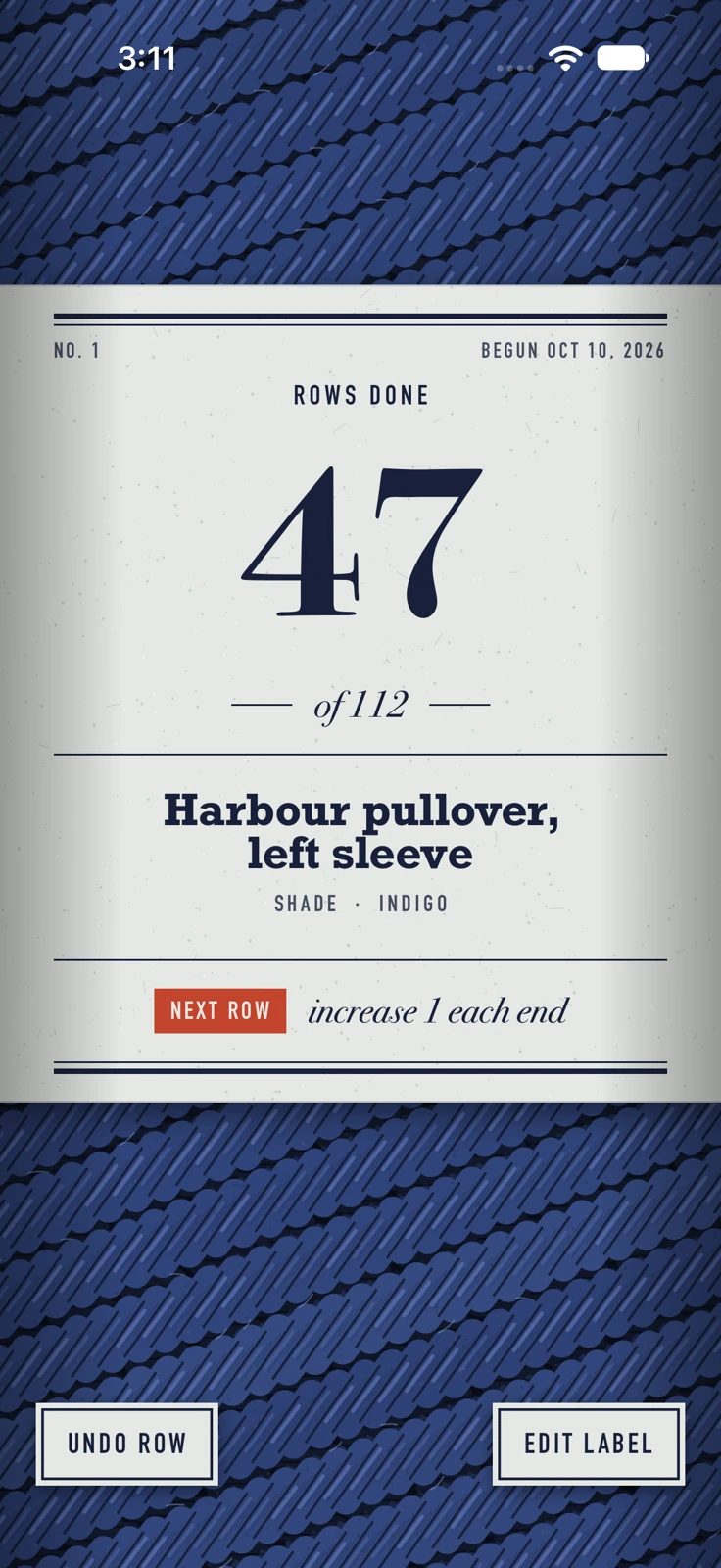 The Worsted counter on iPhone: a paper yarn band reading 47 rows done of 112 for a Harbour pullover sleeve, on indigo knitted fabric.